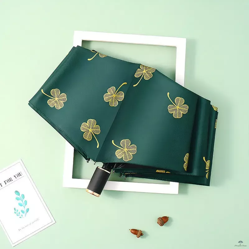 Parapluie Trèfle Chic – L’accessoire porte-bonheur au style raffiné pour affronter pluie et soleil